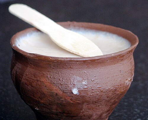 Fresh dahi set in a clay pot